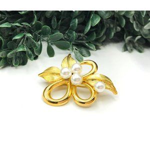 Vintage brooch gold tone bow design with four white beads 2" length